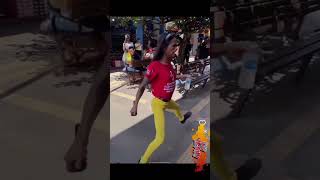 Women hits in a banner, skinny man fanny dancing