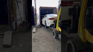 Vehicles load into a 40” container w 4 cars