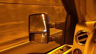 Porsche GT4 driving through a tunnel