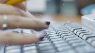 Close-up of woman typing on keyboard. Action. Beautiful female hands with manicure quickly type on