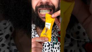 Trying a Mini Gold hard candy vs braces ASMR  #braces #shortsasmr