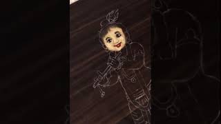 How to colour Krishna’s face in rangoli