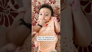 Newborn baby keeps hands in her mouth. #baby #puzzled #trendingshorts #cute #trendingvideo #girlbaby