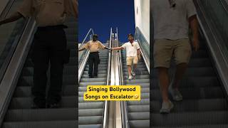 Singing Bollywood Songs on the Escalator 😳 #bollywood #viral #singinginpublic