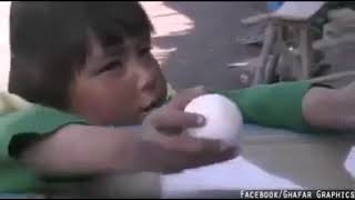 afghan small kid selling egg