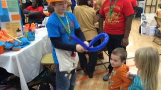 Thor Peterson making a balloon hat