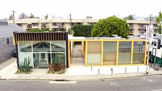 The NASA Group building, black and yellow exterior - West Hollywood | Drone footage