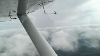 Cessna 150 above the clouds