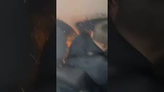 dude shoots rockt in car