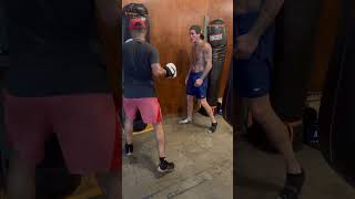 Paul Spadafora teaching on the wall bag at Kakaako Boxing Club #boxing #hawaii #fighter #spadafora