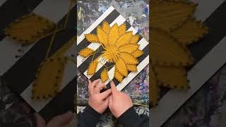 Stringing a Sunflower String Art Design