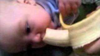 Baby eats banana