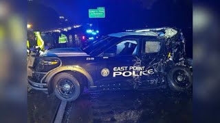 Officers hospitalized after tractor-trailer hits cruisers, snarls traffic on I-285 S in Fulton Co...