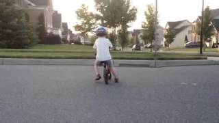 Aaron rides Strider bike