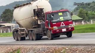 Hyundai truck trailer vs truck trailer and Cement truck driver on the road, heavy vehicle, truck