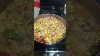 cooking ackee and salt fish with banana, yam and ripe plantain