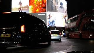 Huge Billboard Screen In Busy London Street At Night