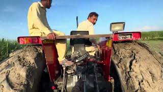 Tractor Cutting Through Mud!