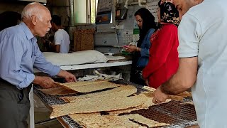 Baking tasty sangak bread in a traditional way in Iran | bread making video