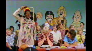 Tiswas. Lenny Henry as Algernon Razzamataz as artist.   Kids win competition. 1980