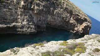 Gozo-Malta amazing places-Limestone canal to bring up seawater to saltpans and Ramla Beach