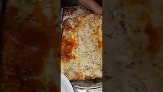 Eating  spicy Lasagna