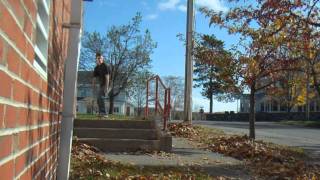 Slow-Mo Frontside Boneless Over A Handrail