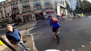 Red light running cyclist got upset because I rang my bell as a warning. London, Regent street.