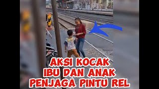 AKSI KOCAK DAN MENGHIBUR IBU PENJAGA PINTU REL KERETA API