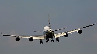 B747 hard landing, due to turbulence previous B747 landing