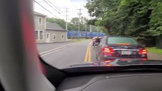 first time at a railroad crossing in America when a train was passing by