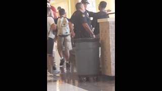 White cops take down black high schooler in middle of school hallway