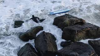 Surfer gets swept into Jetty. Long Beach, NY