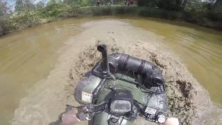 Honda 350 on 27 outlaws going through a pond