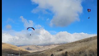 Chilling in the hills with the paragliders