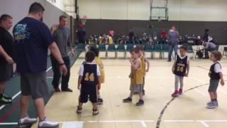 Identical twins play basketball