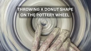 How to throw a clay donut shape on the pottery wheel.