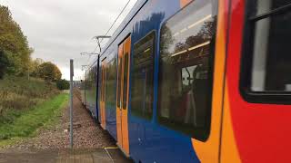 Sheffield tram train 205 departs Sheffield railway station bound for hearings park