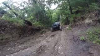 Connor trying to climb to the top of slick clay hard rock Ocala fl