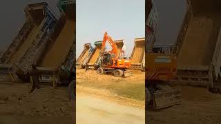 Efficient Dumper Cleaning Technique Used In Construction with Excavator's Hydraulic Arm Jerk