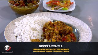 Cerdo adobado en aceite de achiote y lentejas con chorizo y ensalada fresca | Ají