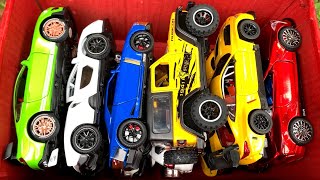 Box Full of Diecast Cars /Ford Mustang GT500, McLaren Senna, GTR R36, BMW M8, Lexus LC 500, Jeep Car