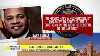 Baltimore officer resigns after video shows him punching man