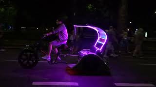 Bike taxi playing Bruce Springsteen music outside Hyde Park