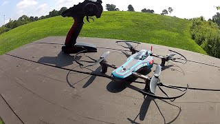 Kyosho Drone Racer flying around the ballfield, avoiding  obstacles.