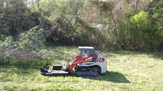 Mowing with skid steer brush mower