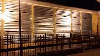 Norfolk Southern Auto Rack Train 19D Makes Its Way Past the Amtrak Depot at Spartanburg, SC 8-28-24.