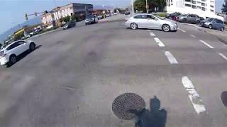 Left turning truck almost hits cyclist