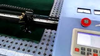 1410 double heads +autofeeding laser cutting machine