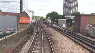 Grenfell Tower in 2014 seen from a passing train